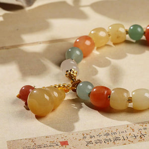 Golden Silk Jade Calabash Wealth Bracelet - FengshuiGallary